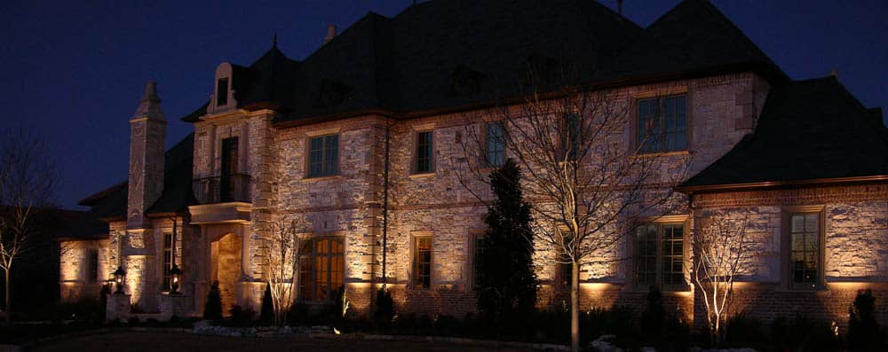 A palatial Westlake home is lit up at night