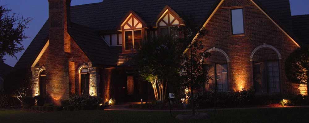 Outdoor Lighting highlights the Tudor architecture of a home