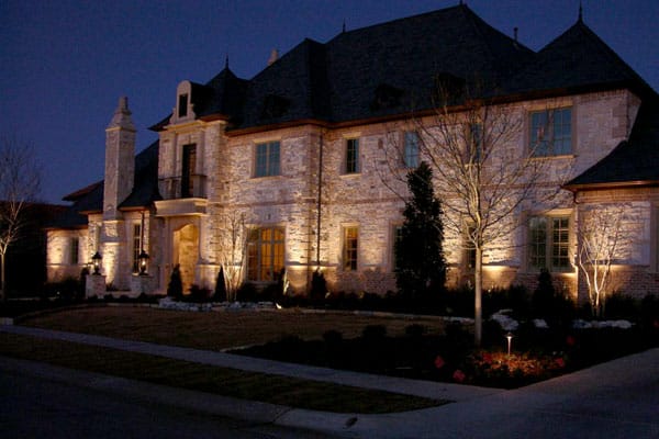 LED lighting accents the exterior of a 2-story home