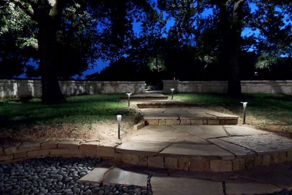 Stone walkway steps lit up with LED pathway lights