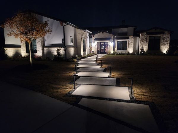 raised path lighting to light up walkway to front door